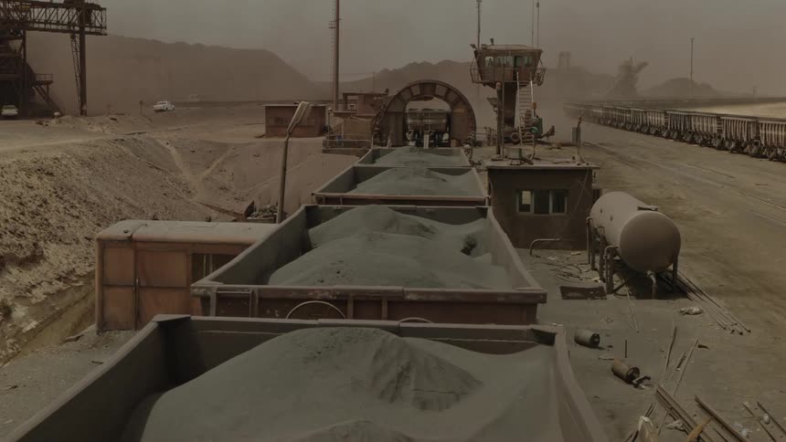 Iron ore is hauled in a train
