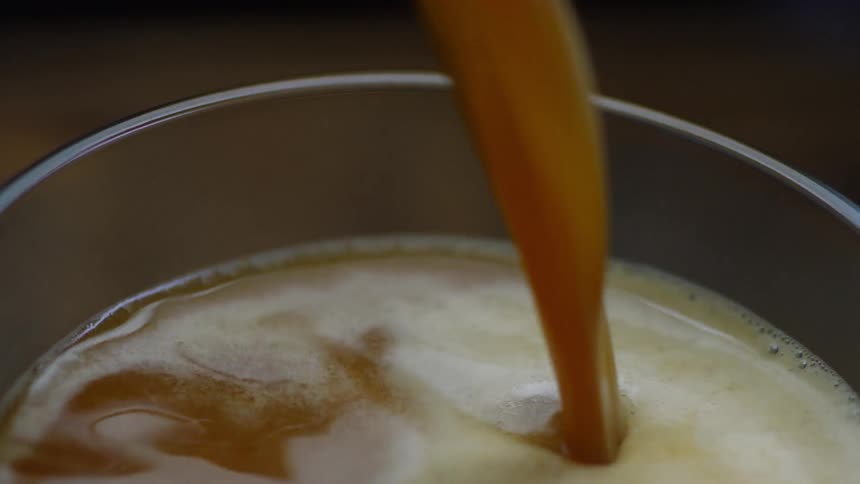 Liquid is poured into a glass