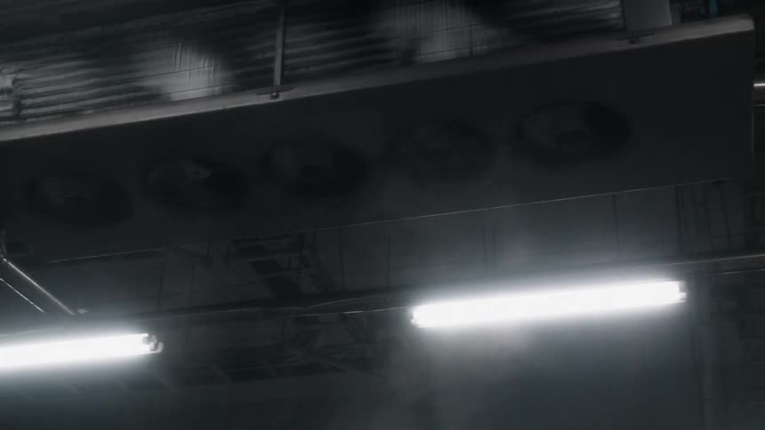 The rain is pouring over the lights on the station