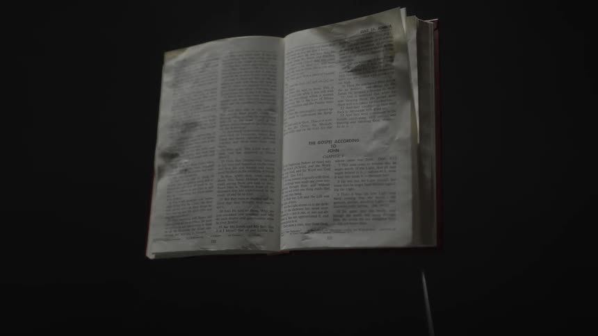 An open book sits untouched