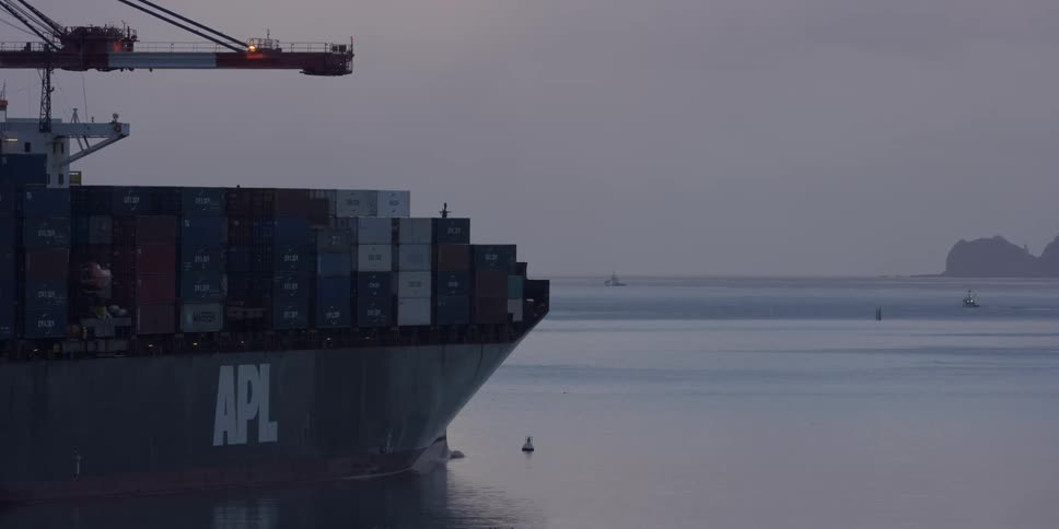 Shipping containers stacked on a barge
