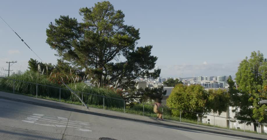 A person skiing on a fence