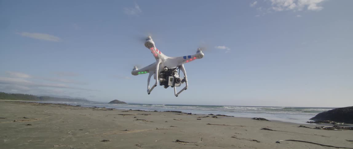 A drone landing on a beach