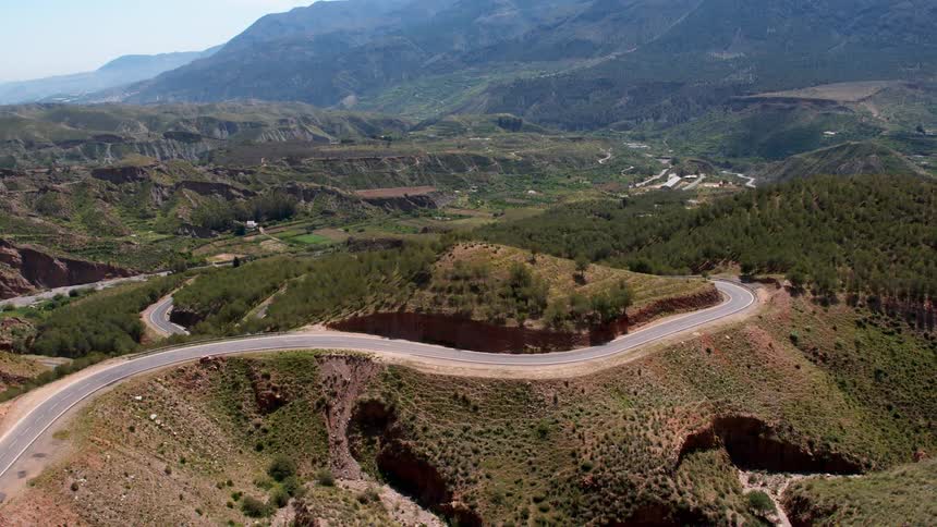 Roads winding through mountains in an exposed rock scenery in Andalucia