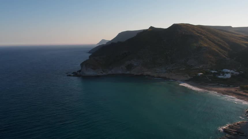 The sea gently touches the sea shore in the south of Spain