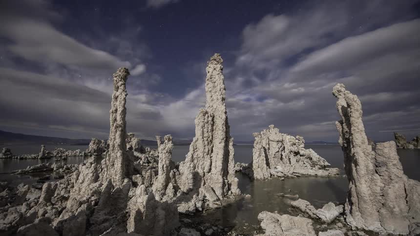 Clouds are drifting over mono lake throughout the day