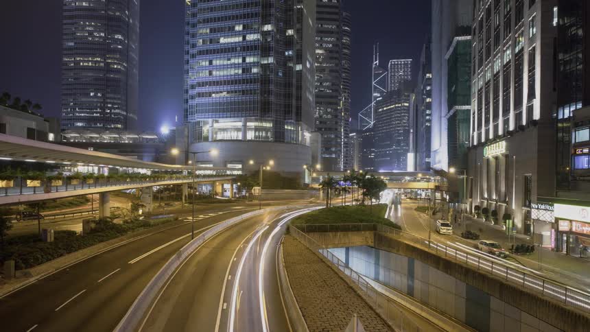 The cars travel along the city expressway