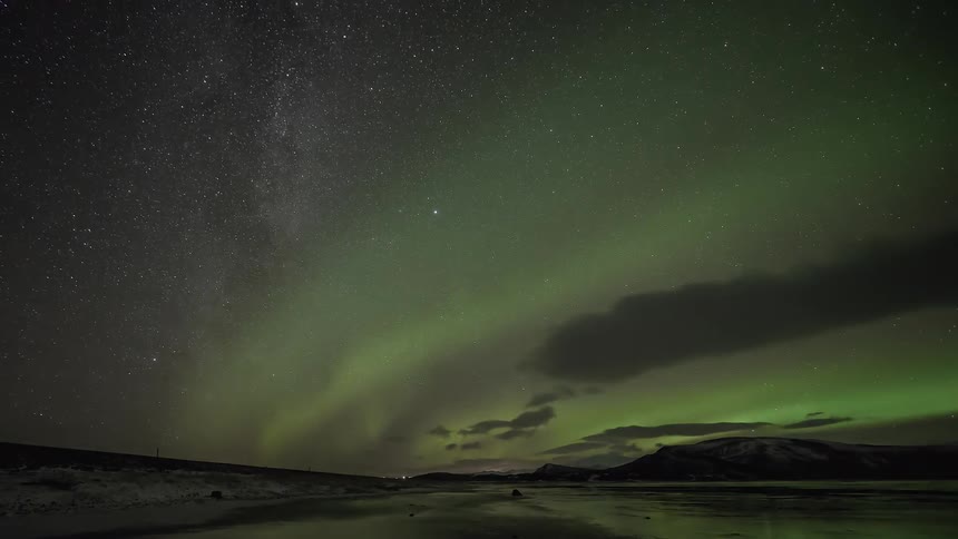 Time lapse of the aurora over a lake
