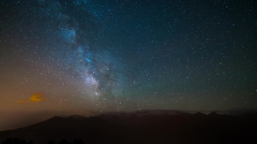 The stars pass overhead in the night sky