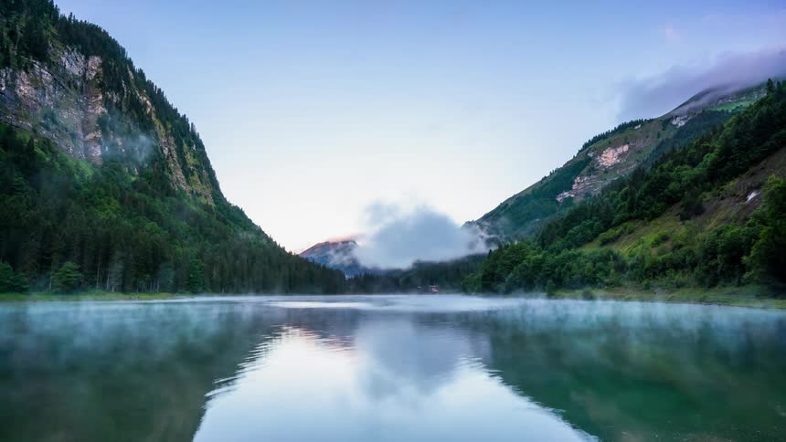 Mountains reflecting in a calm remote lake