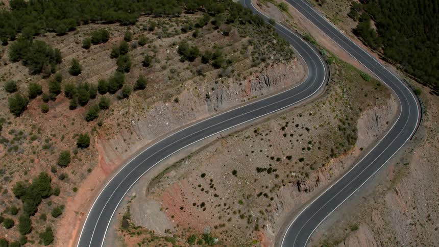 A winding road sits atop the Sierra Nevada mountain range