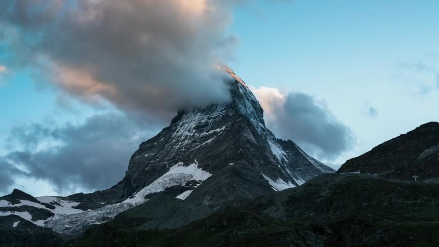 Scenic view of clouds gathering around the Matterhorn