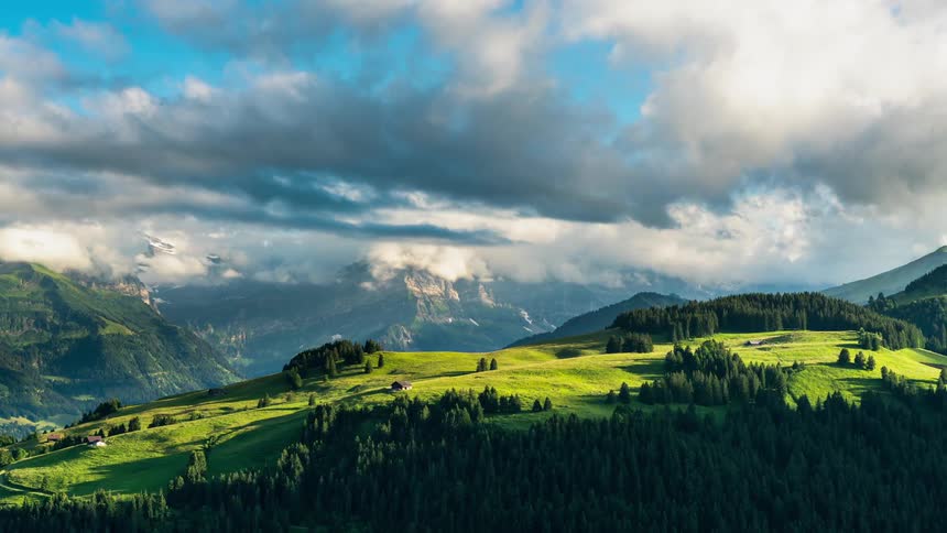 The clouds roll fast over the green valley