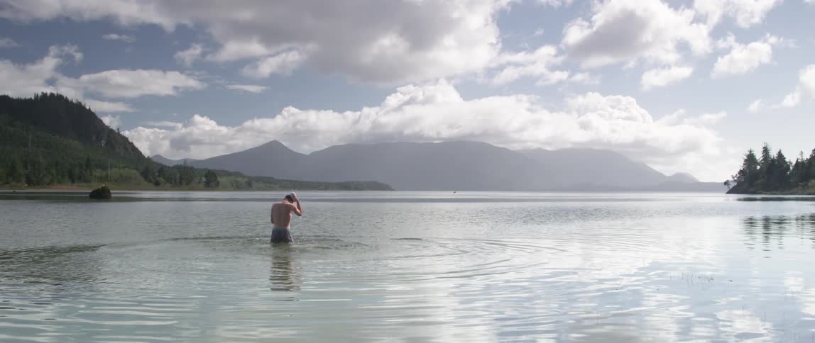 A person coming out of the water