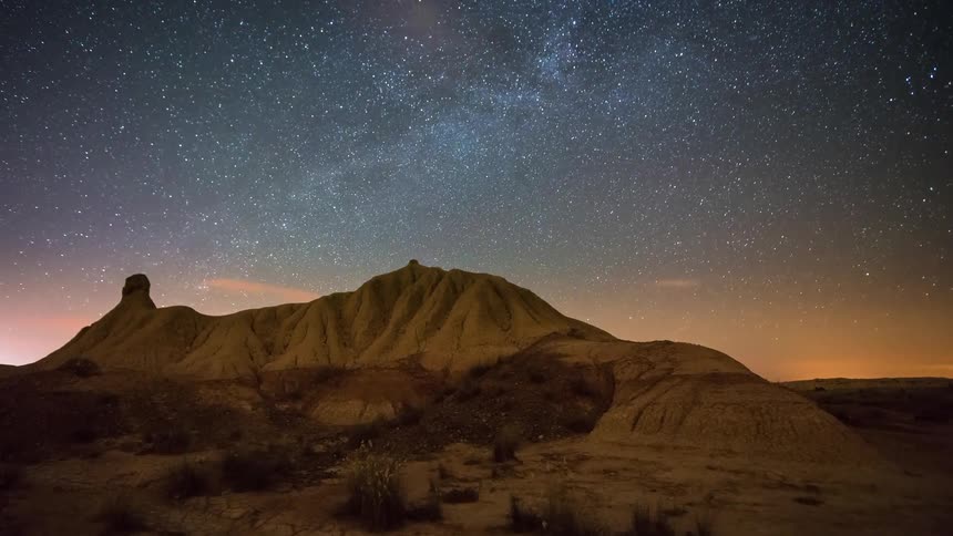 Stars swirl in the night sky
