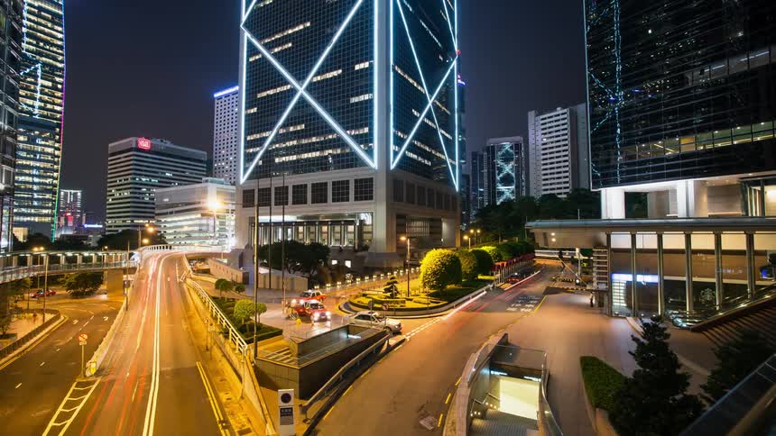 Time lapse of a busy city street at night