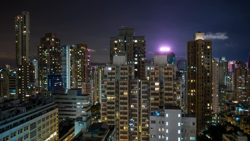 City lights illuminate the night sky