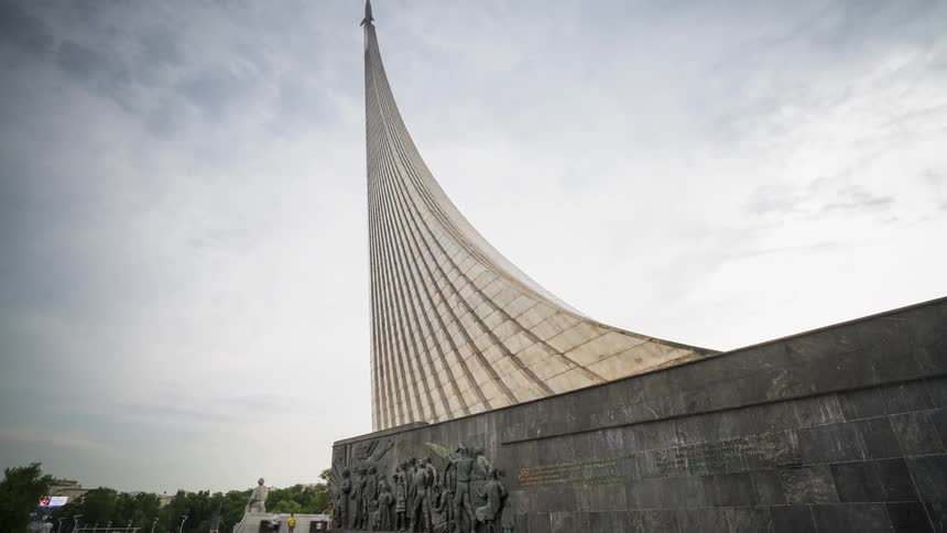 Tourists near the Monument to the Conquerors of Space on a sunny day