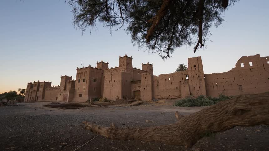 The sun rises illuminating the Kasbah