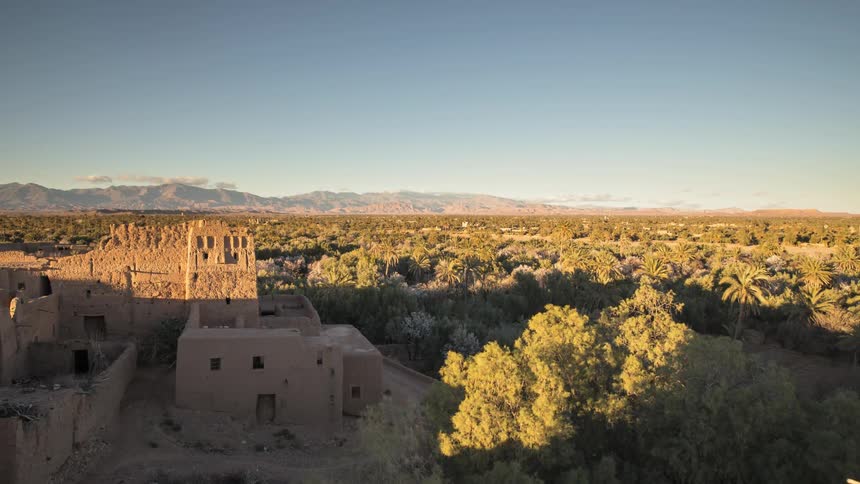 Shadow moves across the ruins of an old fort on a hill