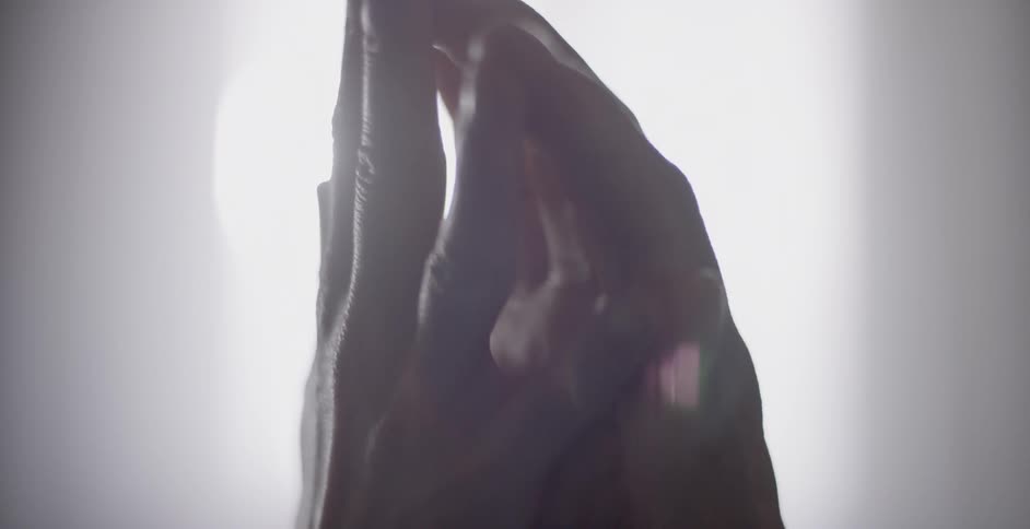 Two hands entwined