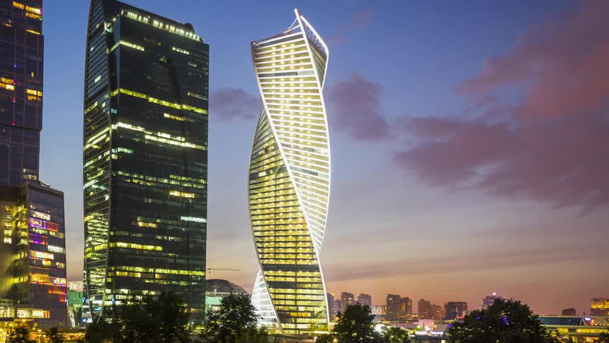 Brightly lit Evolution tower in Moscow at dusk
