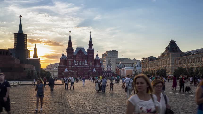 Pedestrians on Red Square at sunset