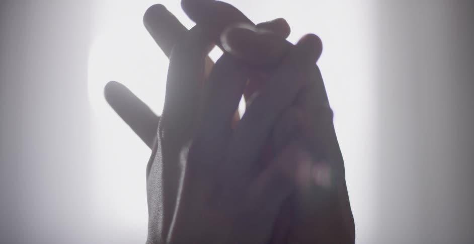 Two people are holding hands