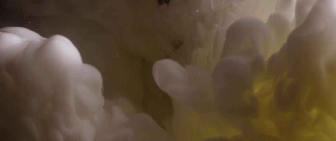 White liquid swirls and flows