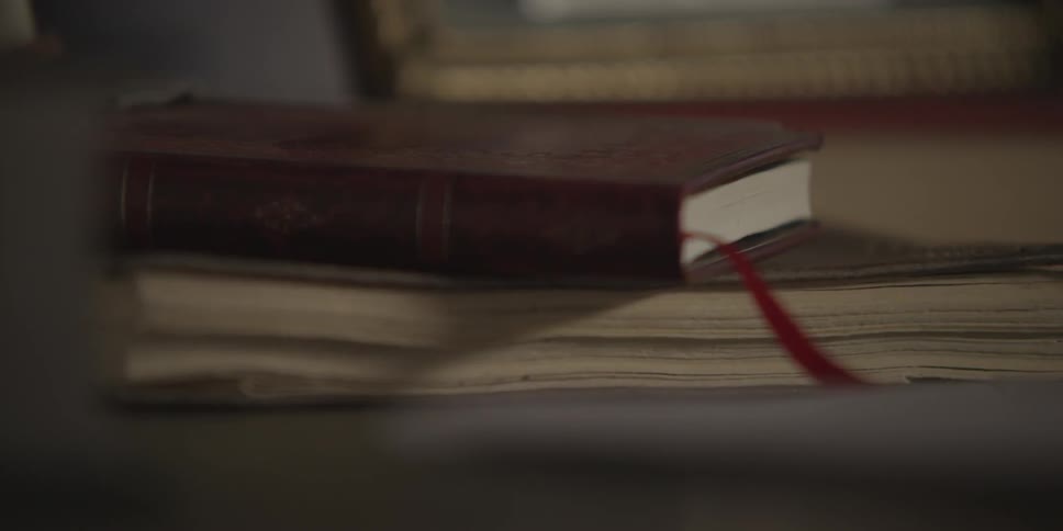 Some books sitting on a table