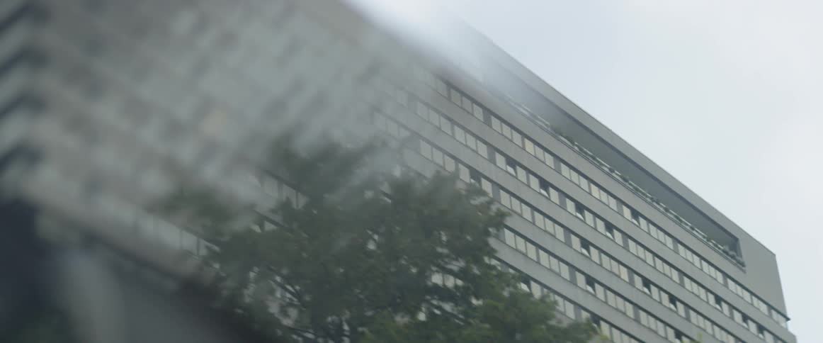 A city building has some windows open