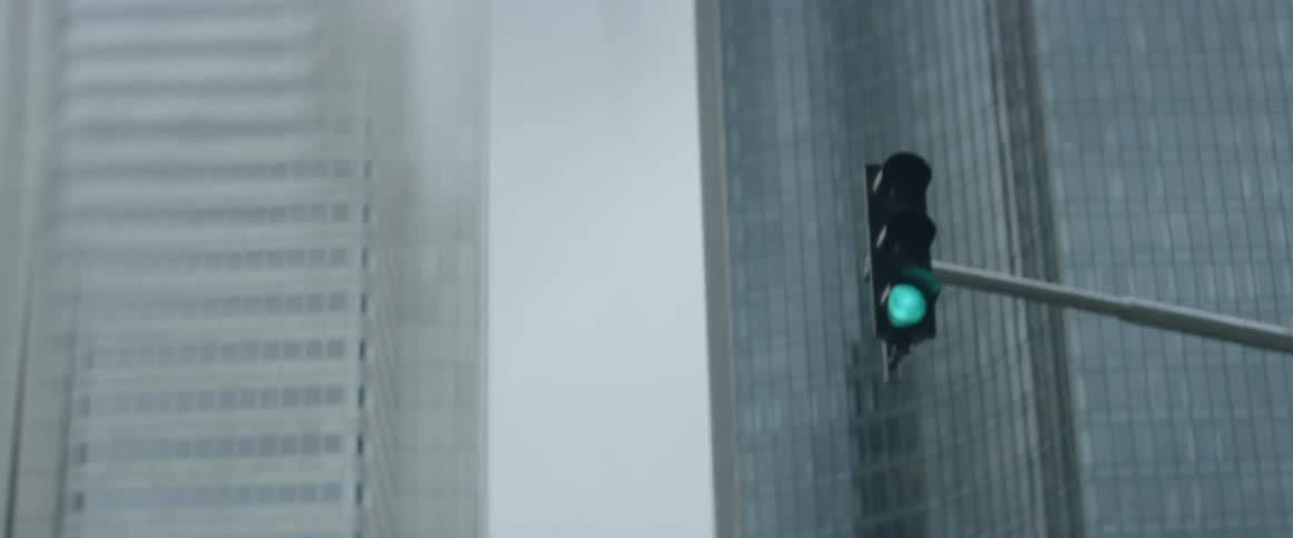 The traffic light in the city is green