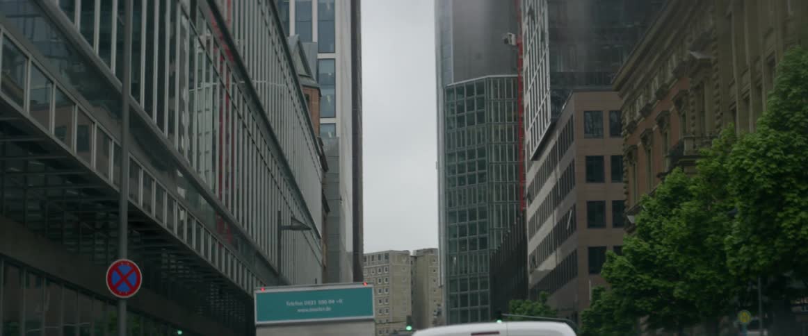 Buildings standing high into the sky in a big city