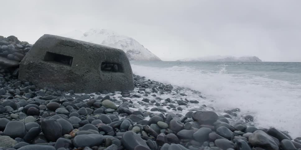 Waves crash onto the rocky shore