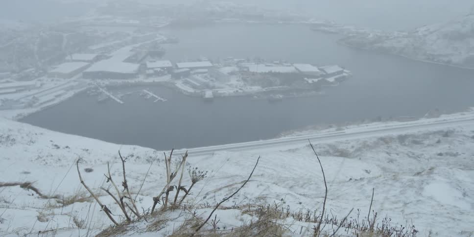 A foggy day above a winter village