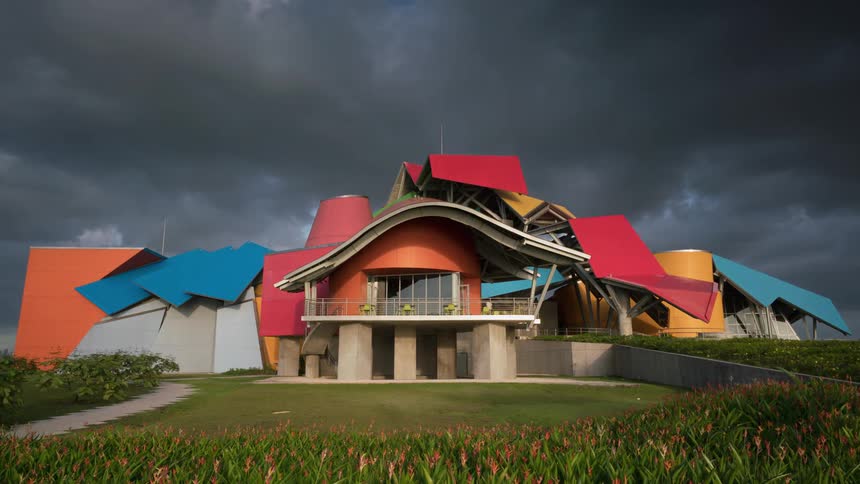 The building is large with colorful panels all over