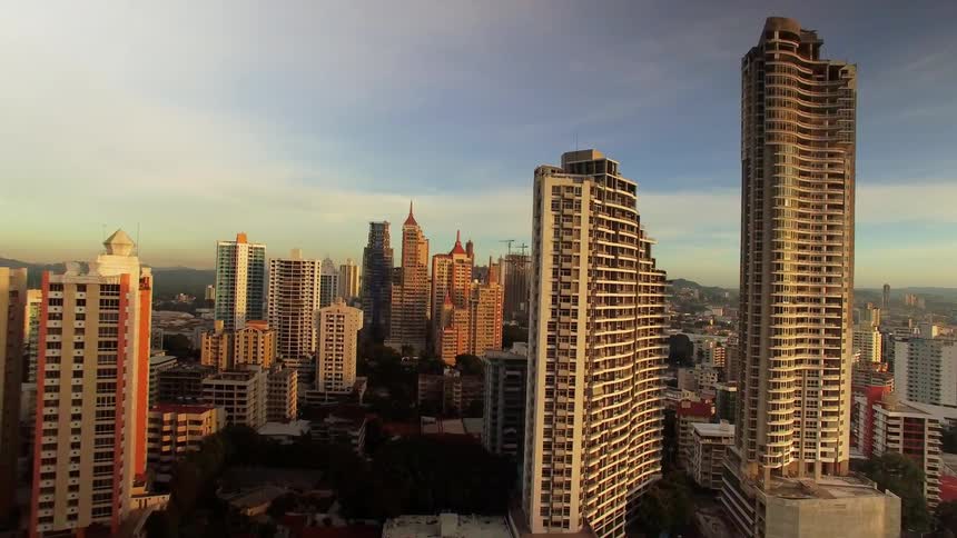 The tall buildings line the cloudy sky of Panama City