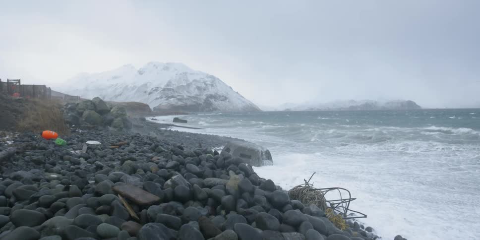 Waves crash onto the rocky shore