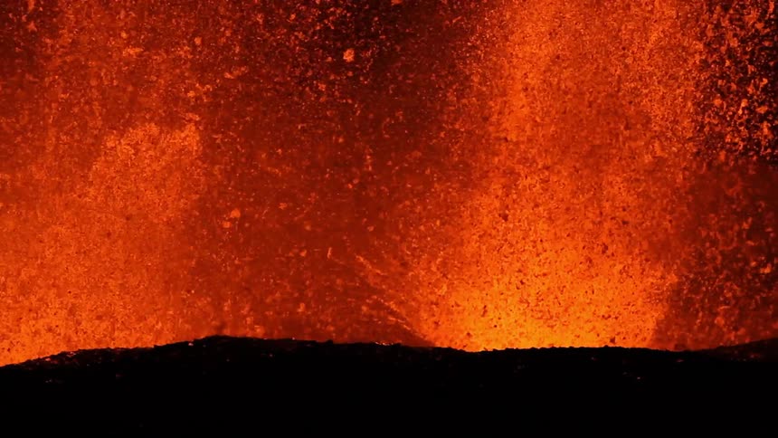 Lava erupts from a volcano