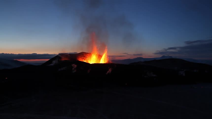 Flames in the distance near sunset