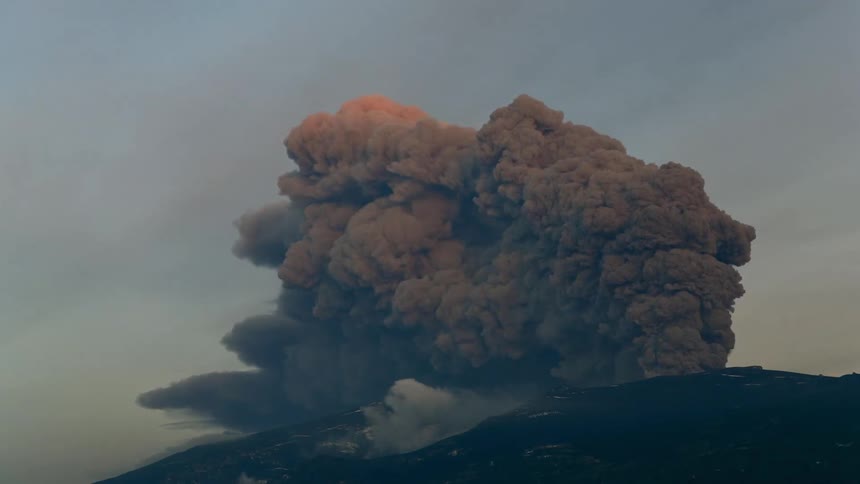 Smoke billows out of a volcano