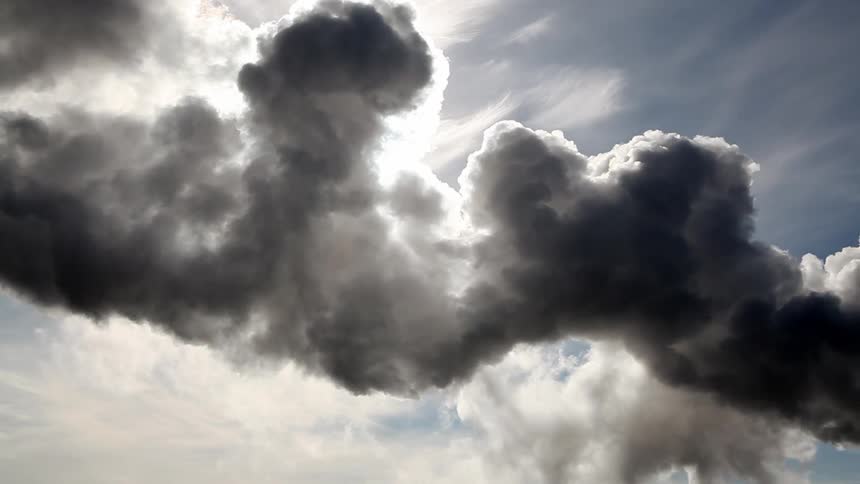 The large clouds move past the skyline