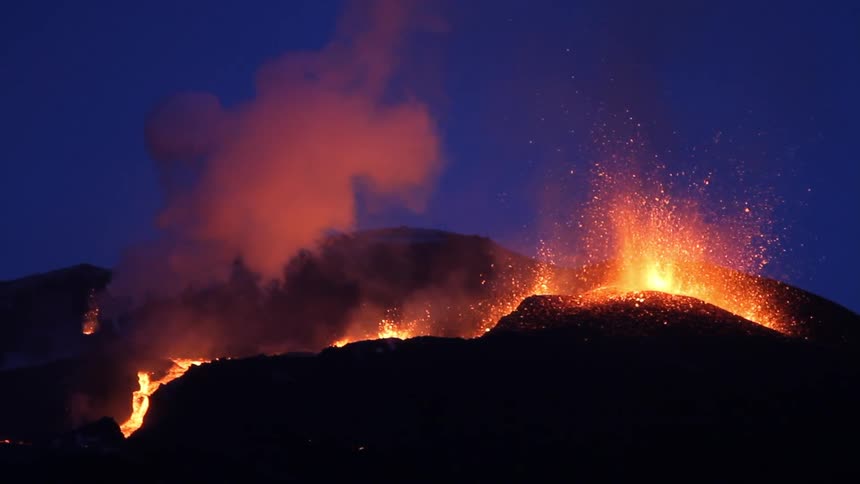 Lava erupts from a volcano