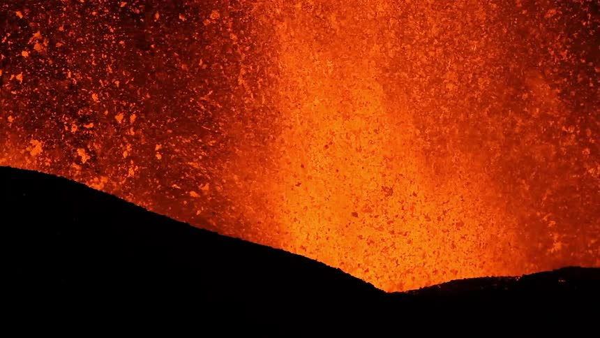 Lava erupts from a volcano