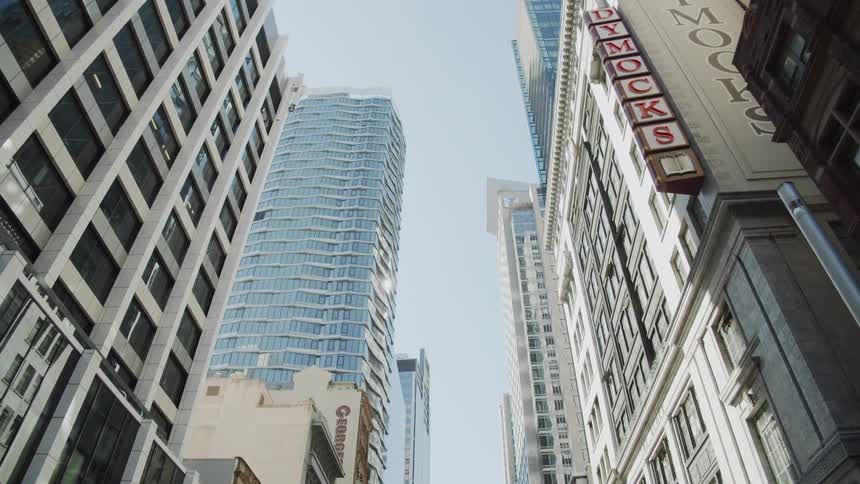 City skyscrapers tower overhead