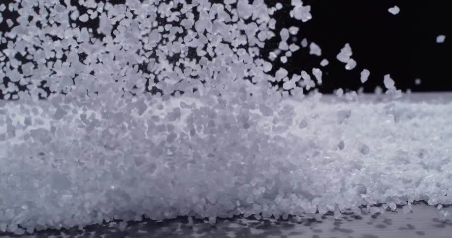 Crystal -like material bouncing into the air and then falling back