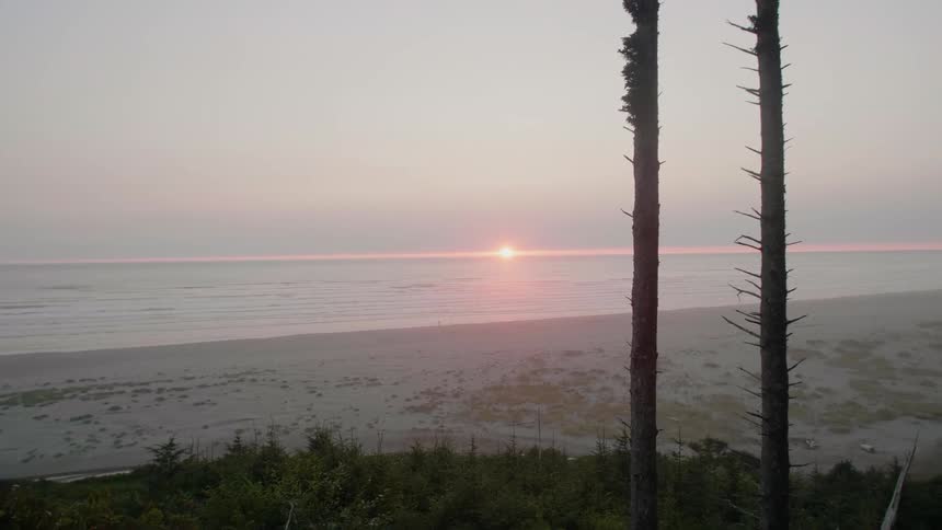 Sun setting over a body of water