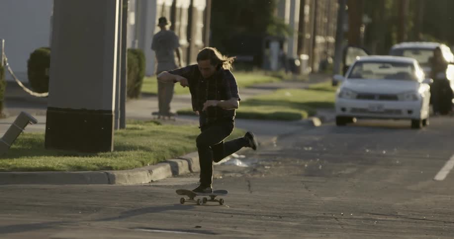 A person skateboarding outdoors