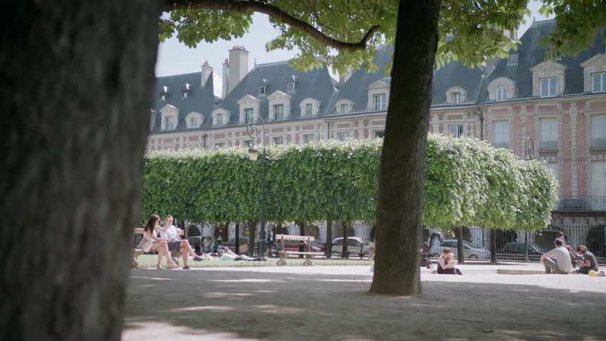 People sit in a city park