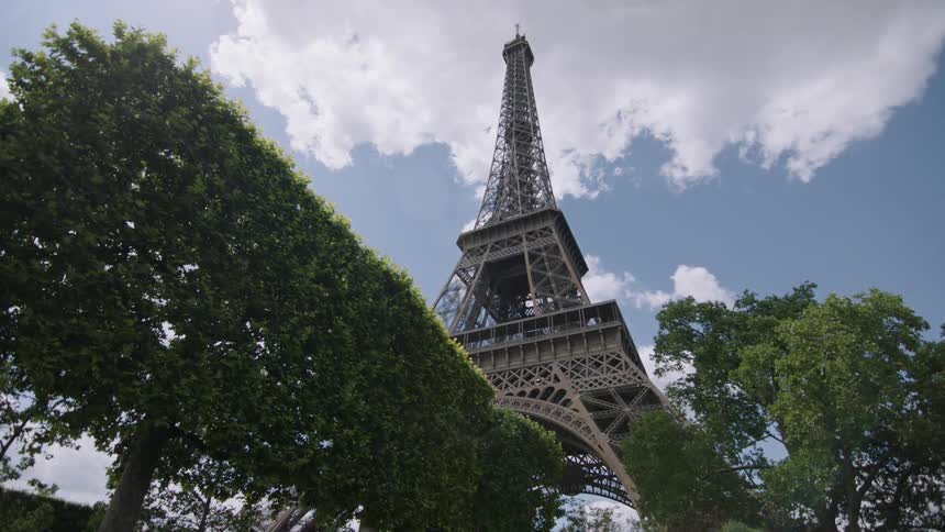 Clouds float above the eiffel tower